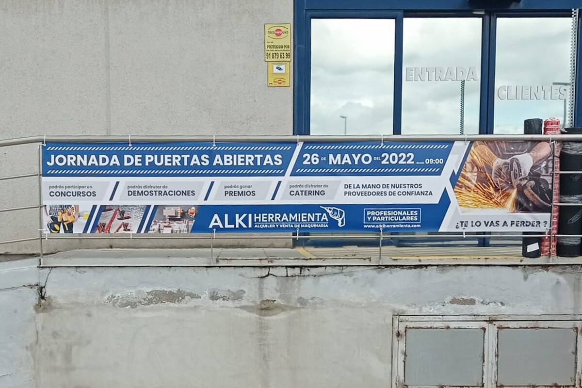 Lona publicitaria frontlit con ojales para fachada, Rotusil Comunidad de Madrid
