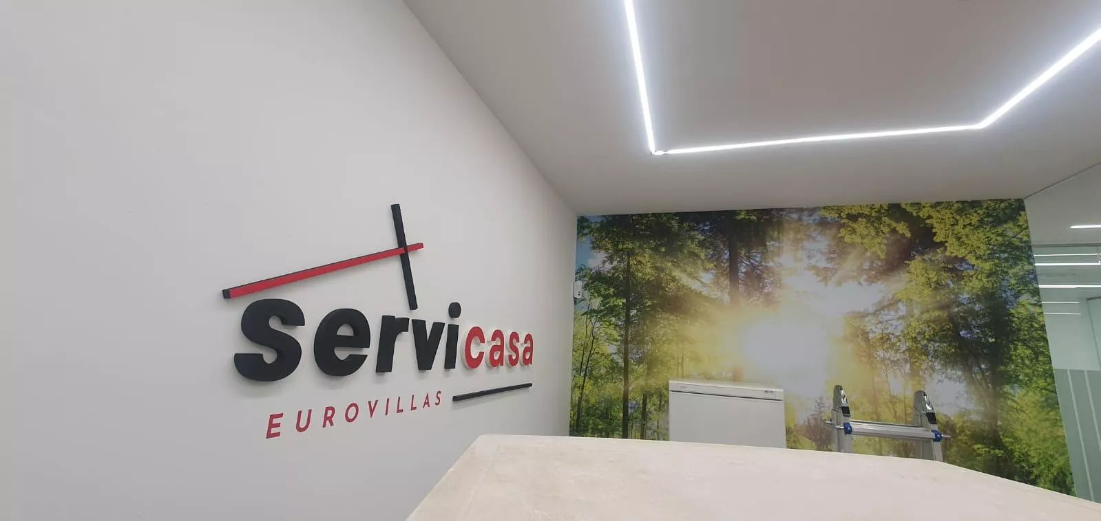 Letras corpóreas de metacrilato con LED en recepción de empresa